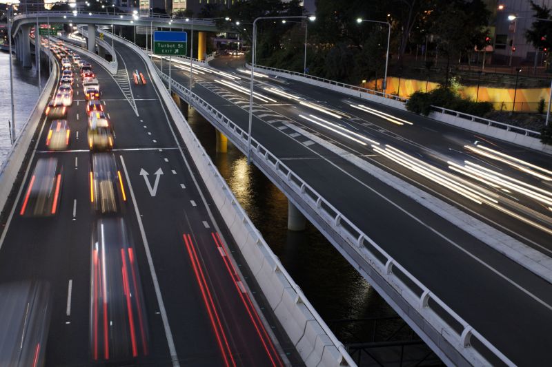 Time lapse photo of highway with moving traffic